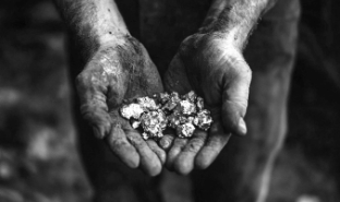 A visual representing human rights in mining, advocating for ethically sourced diamonds and fair labor.