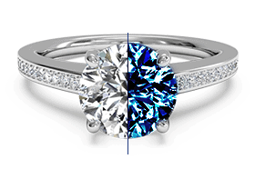 Blue gemstone ring icon for the treatment and processes section, focusing on identifying diamond imitations, synthetics, and enhancements.